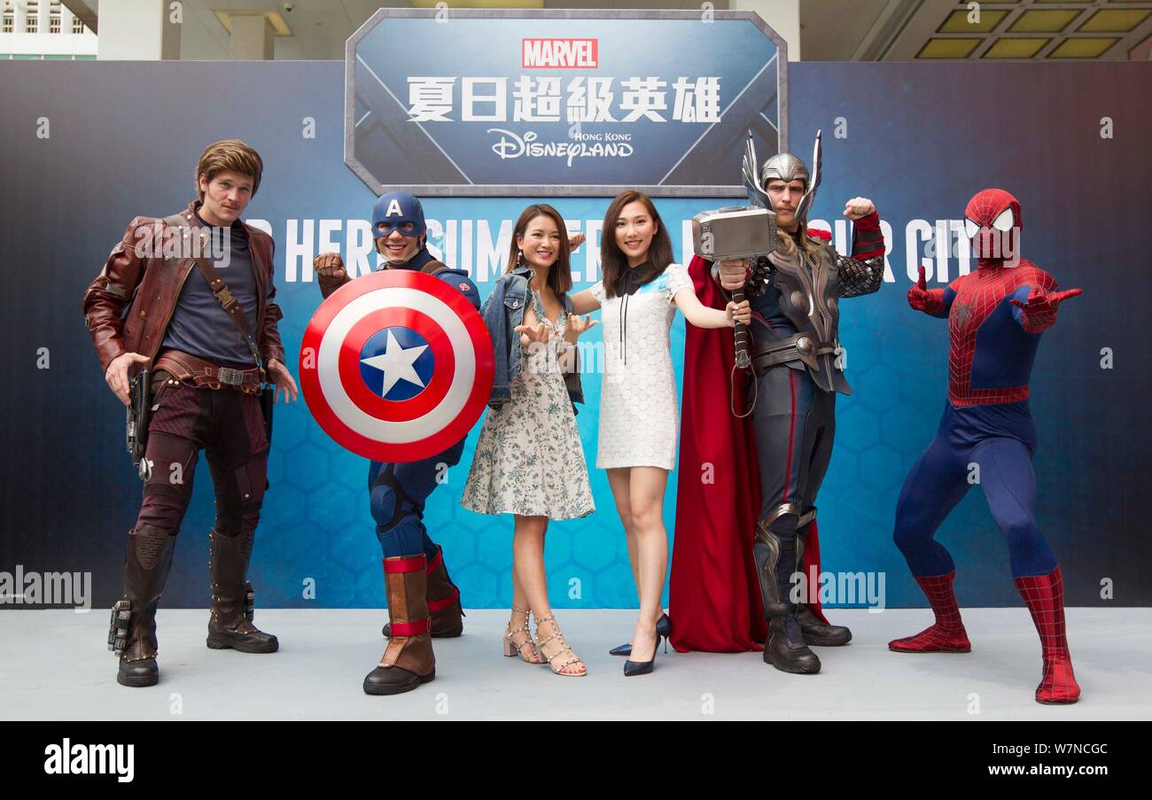 From left) Staff members dressed as Star-Lord, Captain America, Thor and  Spiderman pose for photos with visitors during a super hero summer  exhibitio Stock Photo - Alamy