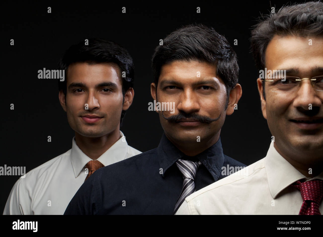 Portrait of business executives in a row Stock Photo