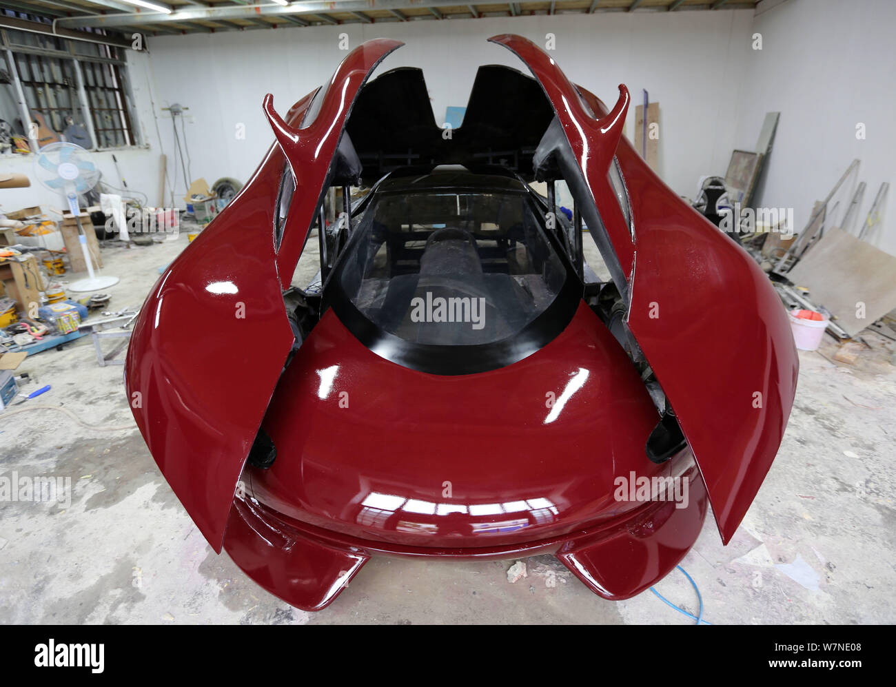 The new generation homemade electric sports car 'Xing Long 2' invented by Chinese car enthusiast Chen Yinxi is pictured at the workshop of his family Stock Photo