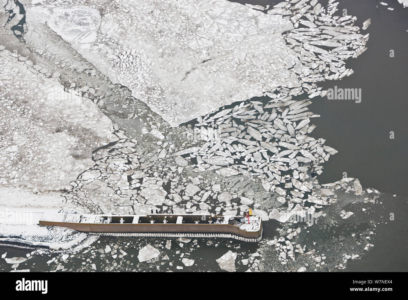 Aerial view of frozen harbour of Langeoog in winter with ice sheets and snow, East Frisia, North Sea, Lower Saxony, Germany February 2012 Stock Photo