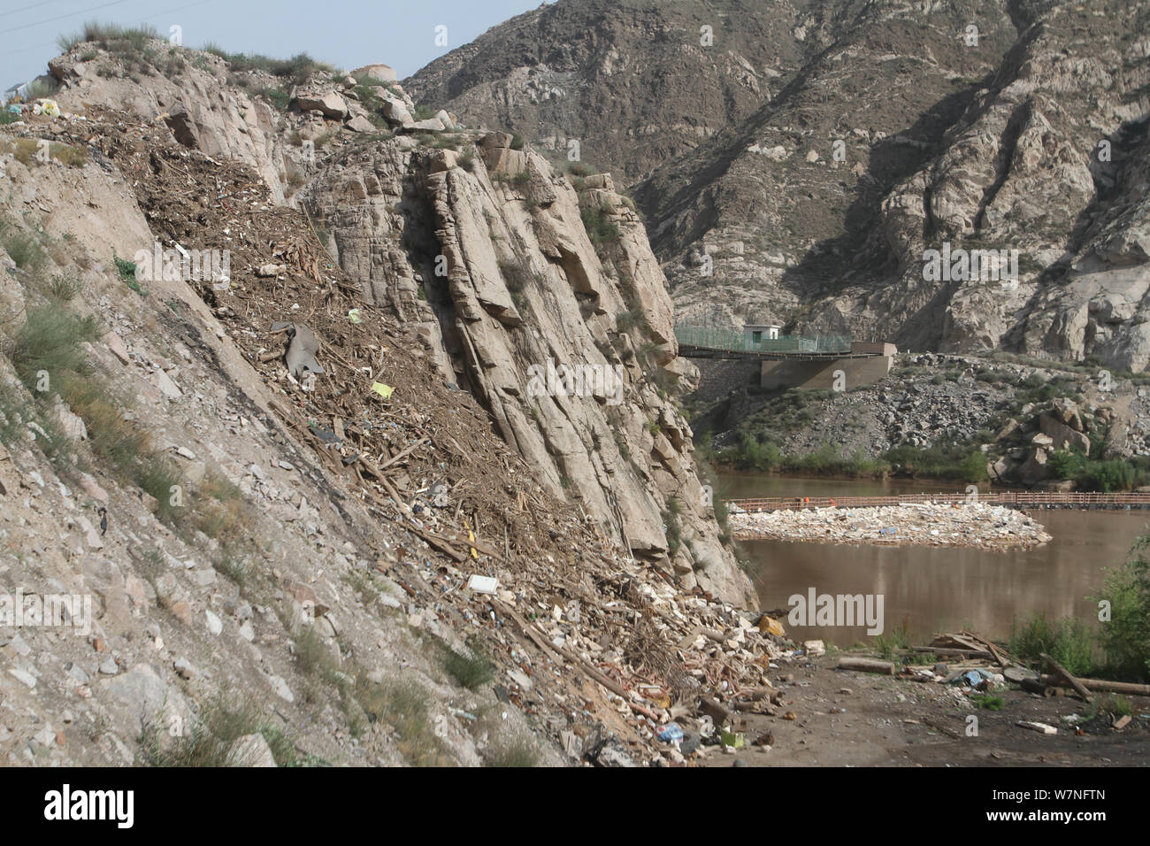 View of the rubbish blocked by a barrier at the Xiaoxia Hydropower Station on the Yellow River in Gaolan county, Lanzhou city, northwest China's Gansu Stock Photo