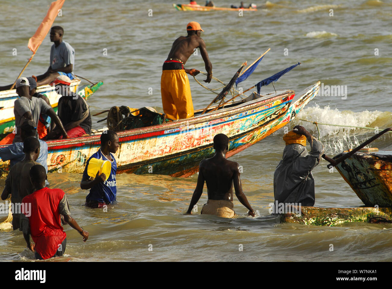Fishermen off the beach in Mbour, in the 'Petite Cote', south of Dakar, Senegal, September 2006. September 2006. Stock Photo