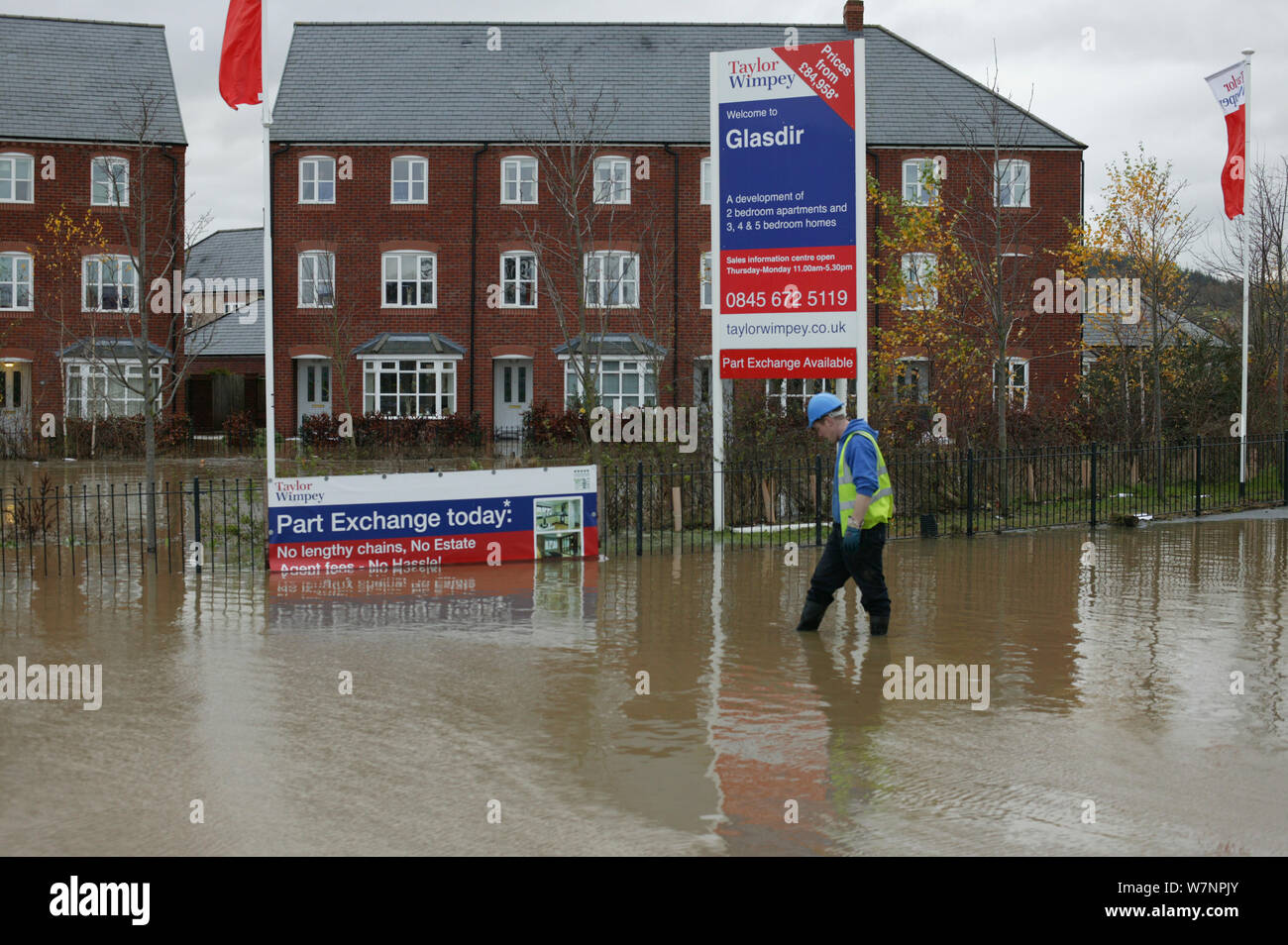 Flooding of newly built housing in the Glasdir estate with houses for sale, Ruthin, the Vale of Clwyd, Denbighshire, Wales, UK.  This is an area at risk of flooding and therefore difficult to obtain House insurance. 27/11/ 2012 Stock Photo