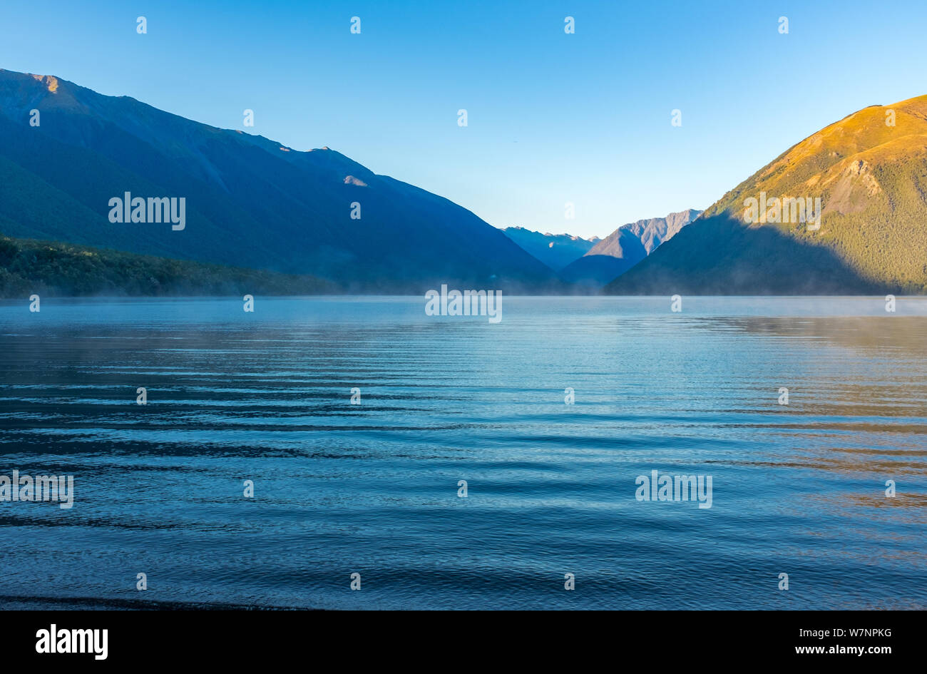 A view down the incredibly beautiful Rotoiti Lake surrounded by mountains which is part of the Nelson Lakes National Park Stock Photo