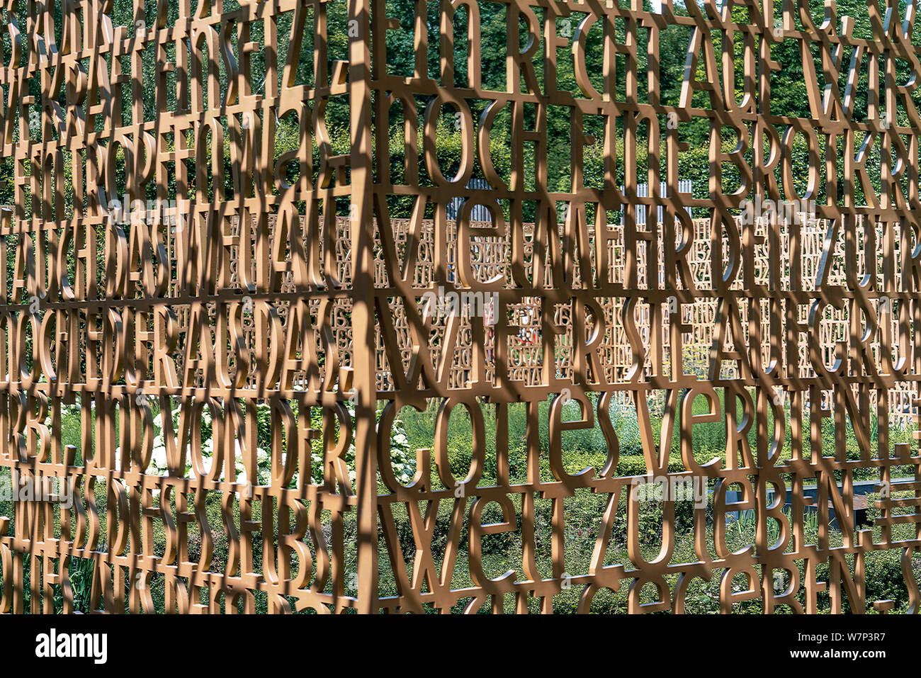 Berlin-Marzahn, Germany - july 18, 2019: Wall with words from the bible in the christian garden at Gaerten der Welt Stock Photo