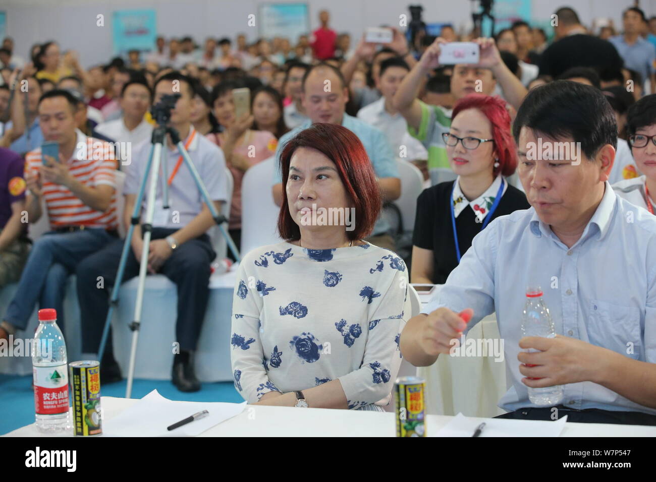Dong Mingzhu, left, Chairwoman and President of Gree Electric Appliances Inc., attends the opening ceremony of the Hainan International Hi-Tech & Indu Stock Photo