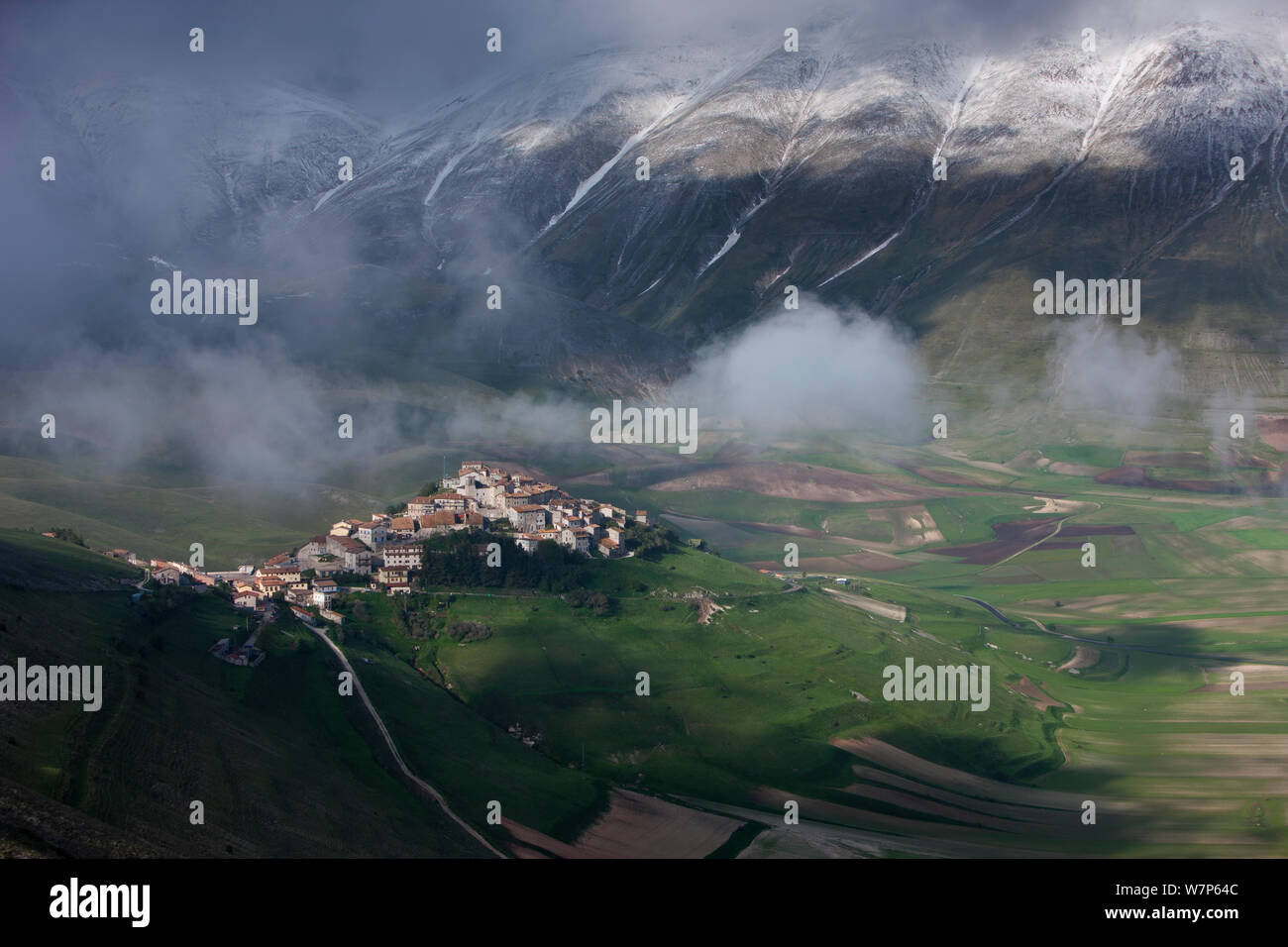 Looking down on Castelluccio and the Piano Grande, Monti Sibillini National Park, Umbria, Italy May 2012 Stock Photo