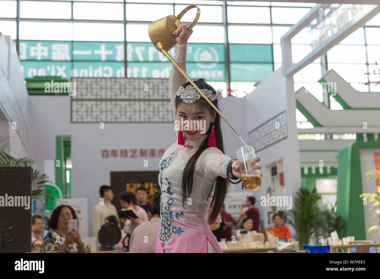 A Chinese artist performs the tea ceremony during the 11th China ...