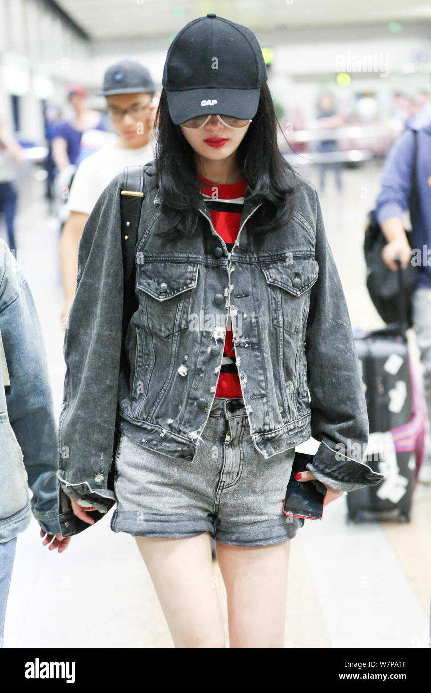 Chinese actress Yang Mi is pictured at the Beijing Capital International  Airport in Beijing, China, 7 June 2017. Coat: Balenciaga Cap: Vetements S  Stock Photo - Alamy