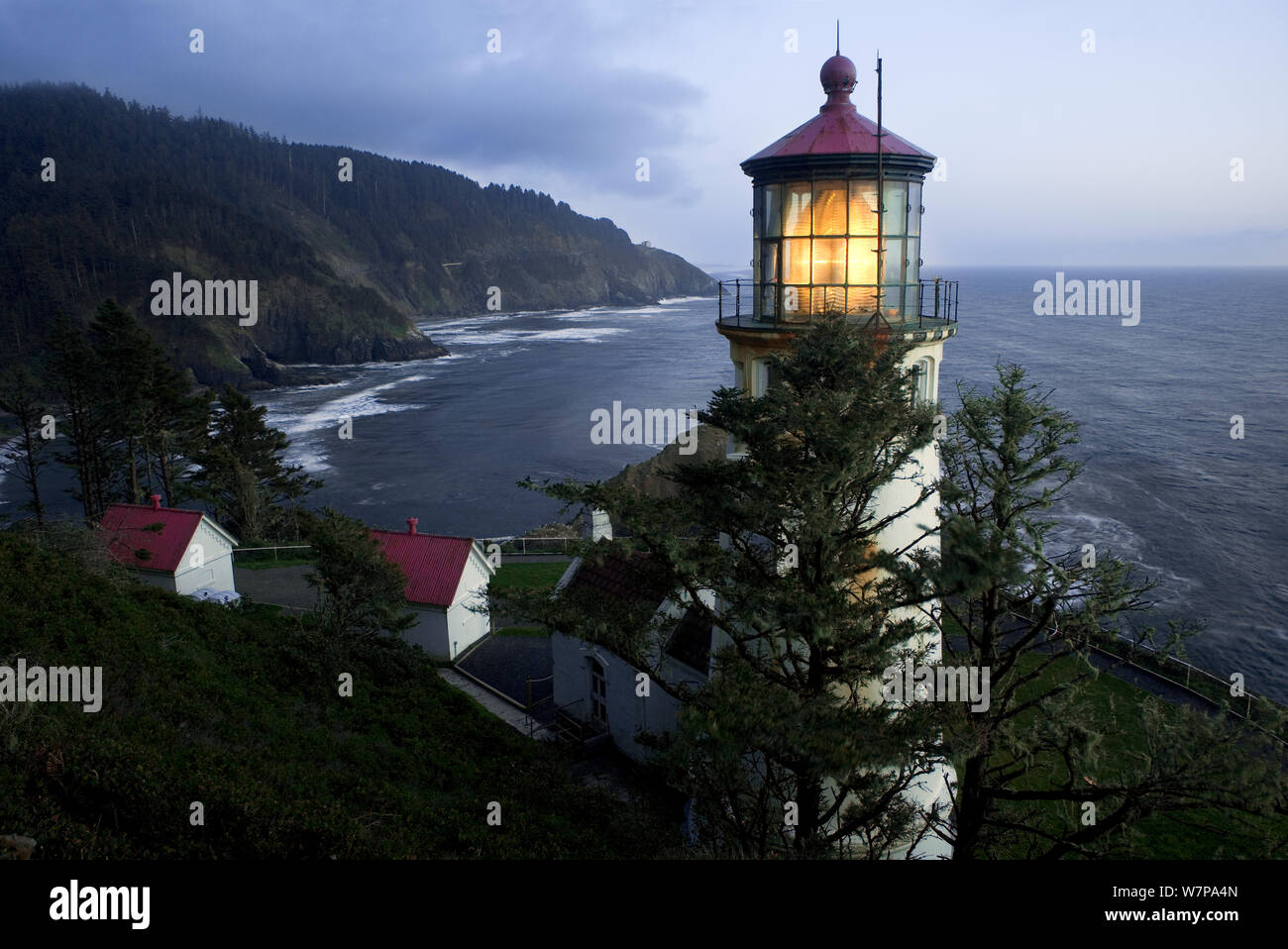 Lighthouse with light on at Heceta Head, Oregon, USA, June 2011 Stock Photo