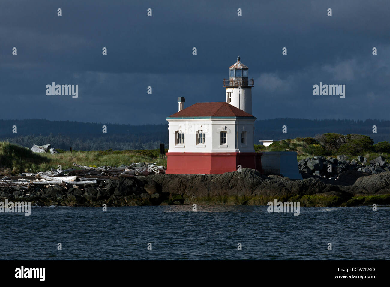 The Coquille River Lighthouse in Bullards Beach State Park, with dark clouds, Bandon, Oregon, USA, June 2012 Stock Photo