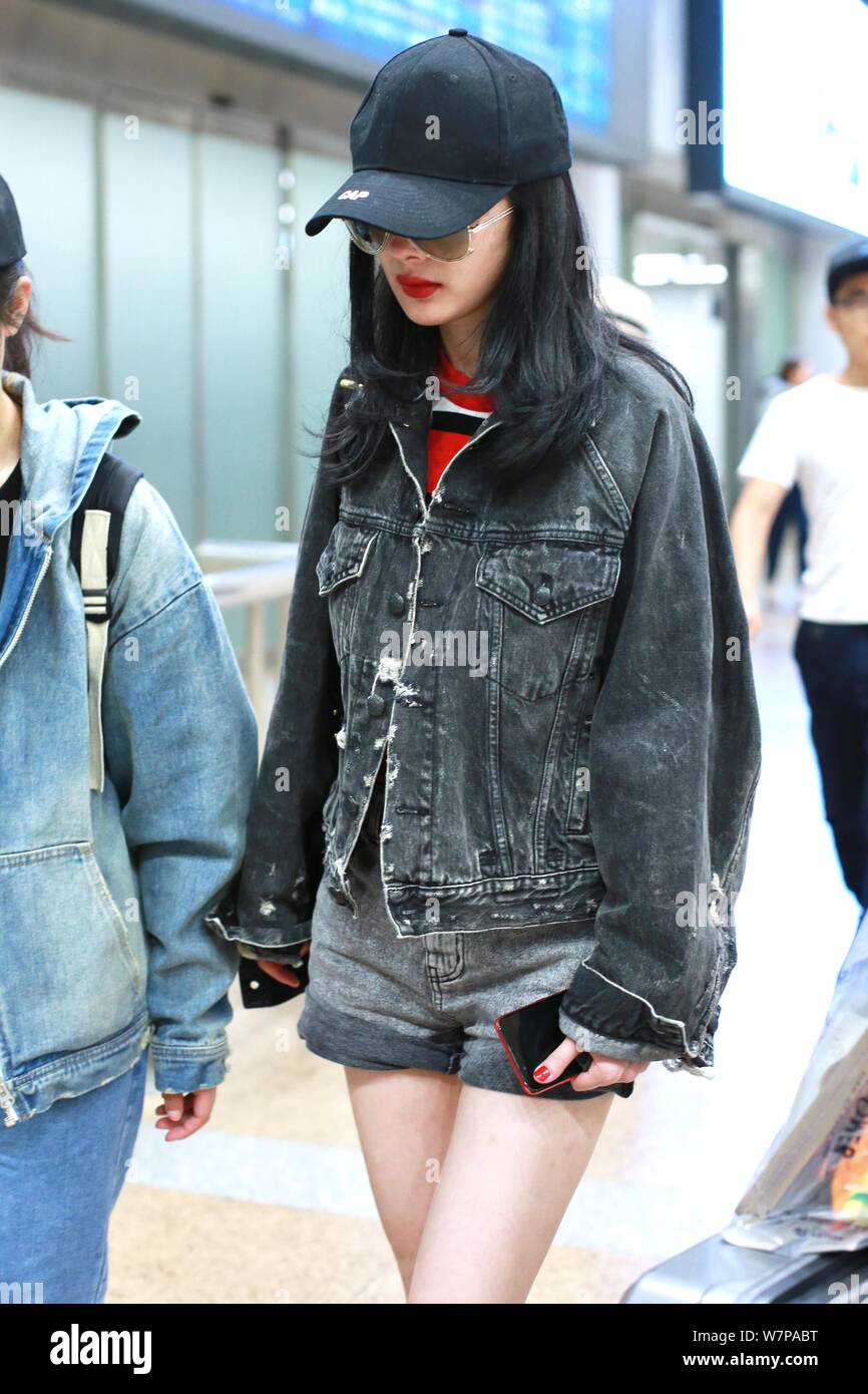 Chinese actress Yang Mi is pictured at the Beijing Capital International  Airport in Beijing, China, 7 June 2017. Coat: Balenciaga Cap: Vetements S  Stock Photo - Alamy