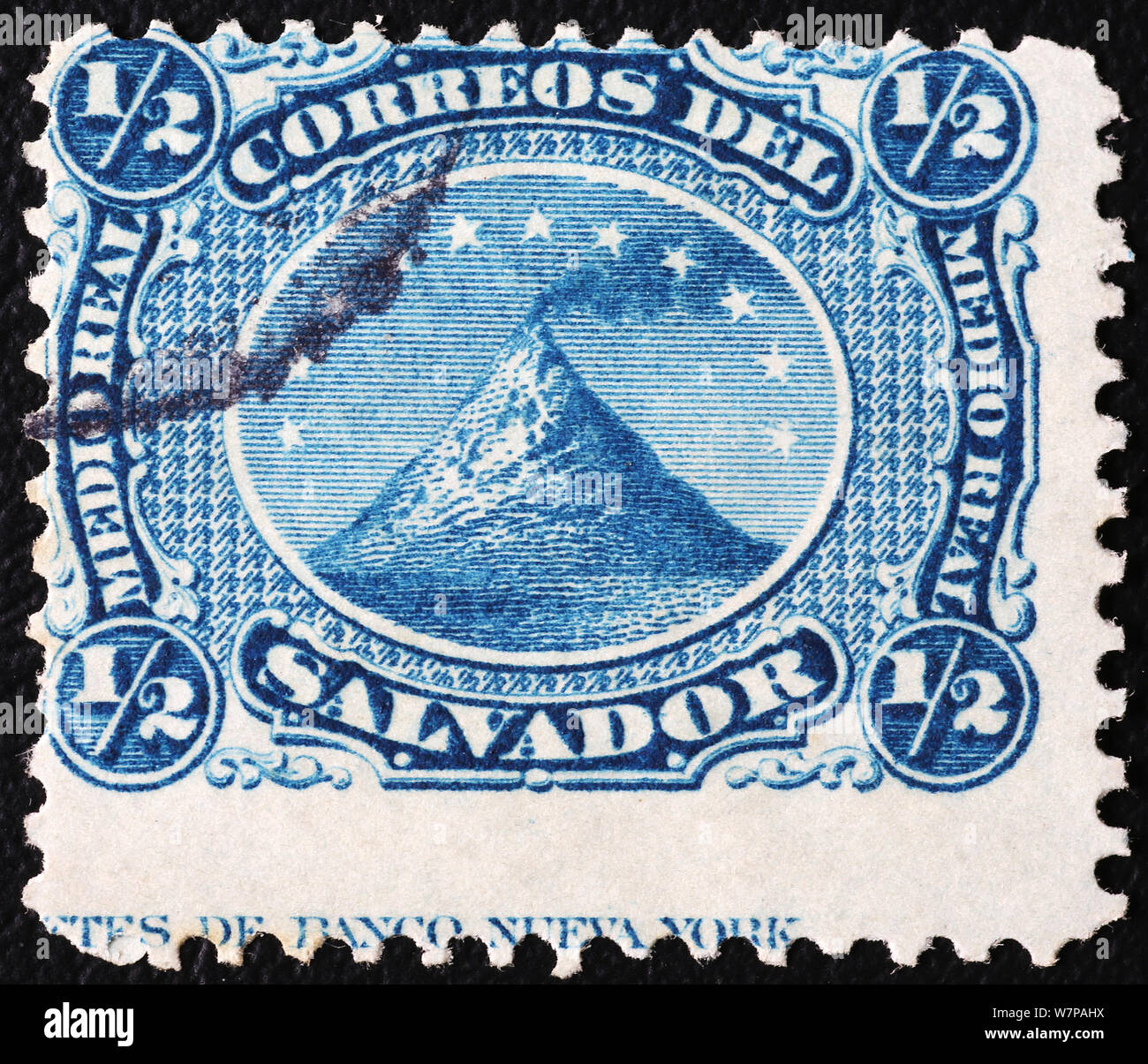 Vulcan on ancient postage stamp of El Salvador Stock Photo