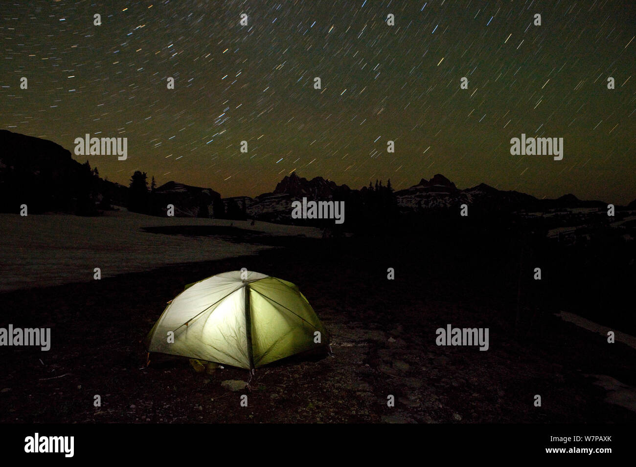 Night time view of a campsite tent on the Death Canyon Shelf along the