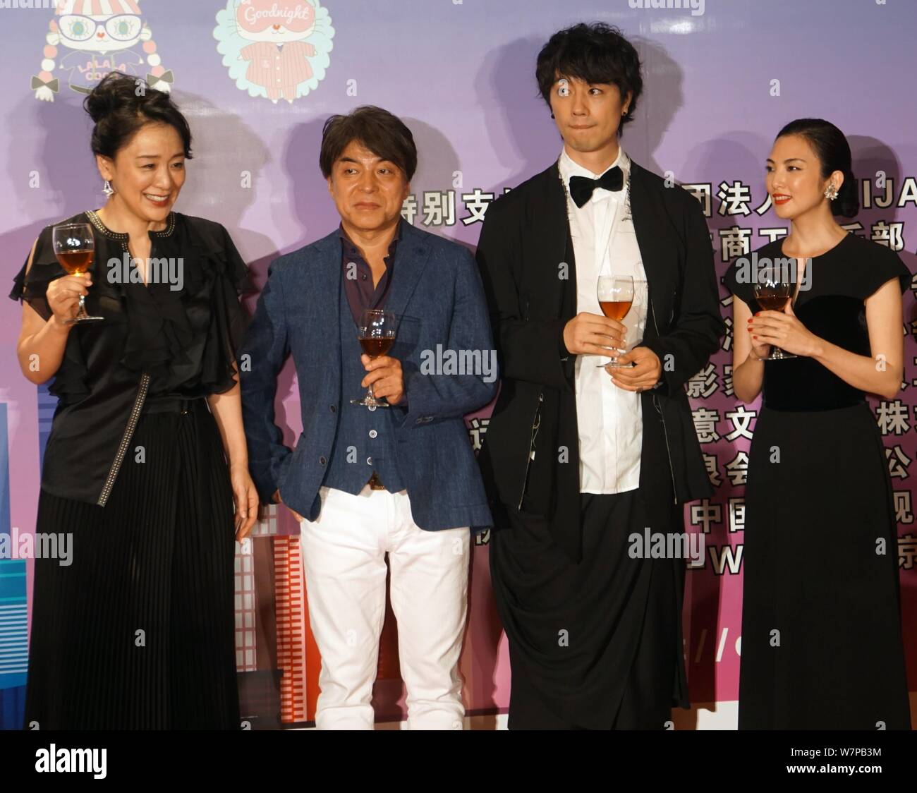 (From second left) Japanese director Hiroshi Nishitani, actor Takumi Saito and actress Rena Tanaka attend the Welcome Dinner of the Japan Film Week du Stock Photo