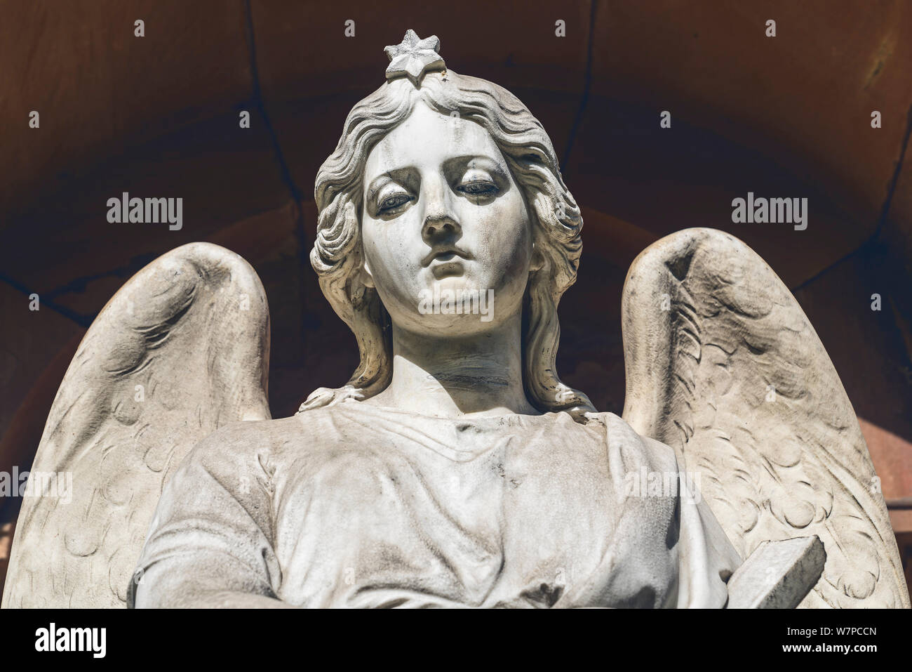 sad angel sculpture. Unknown artist of the 19th century Stock Photo - Alamy