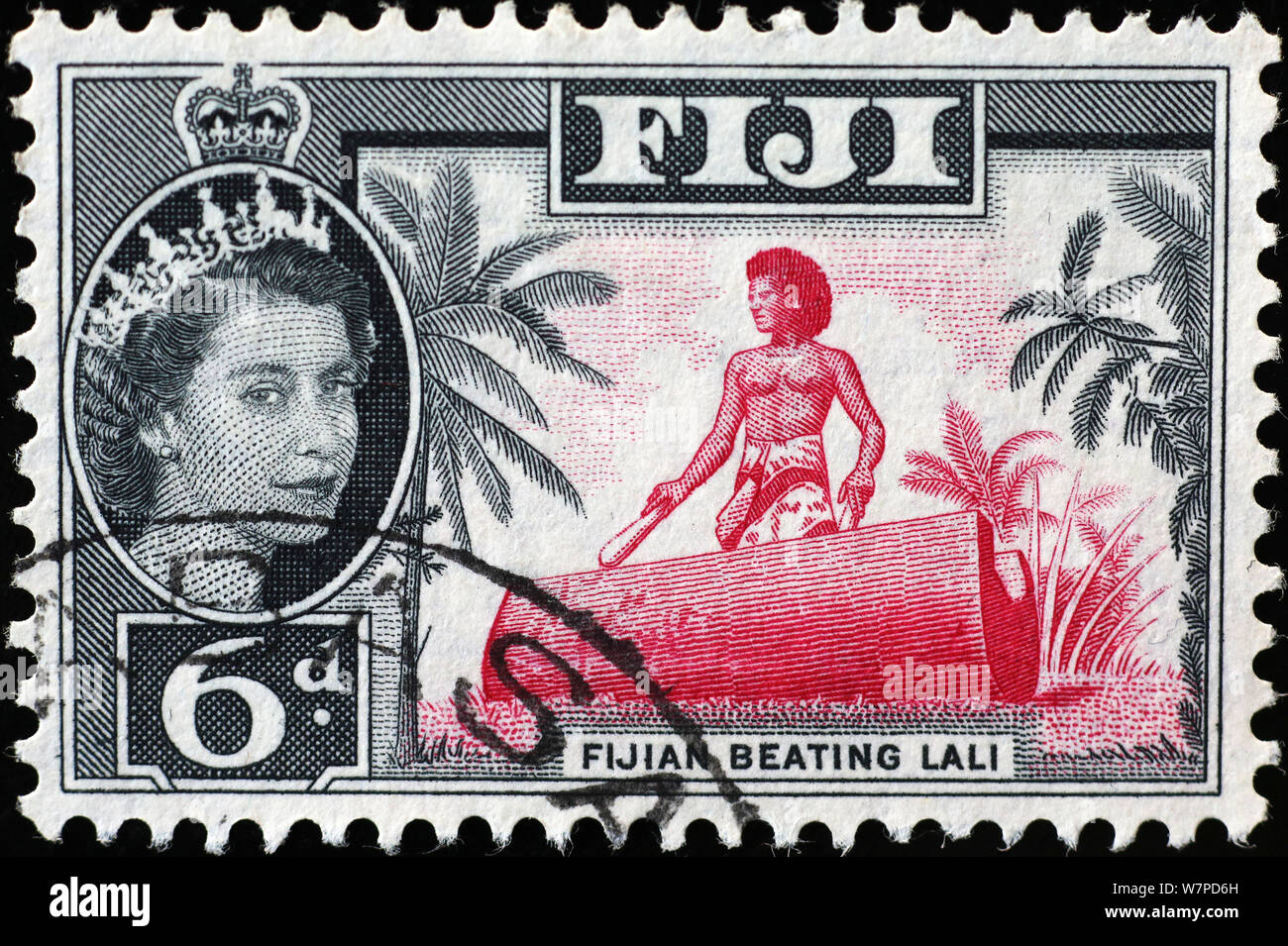 Man drumming on vintage fijian postage stamp Stock Photo Alamy