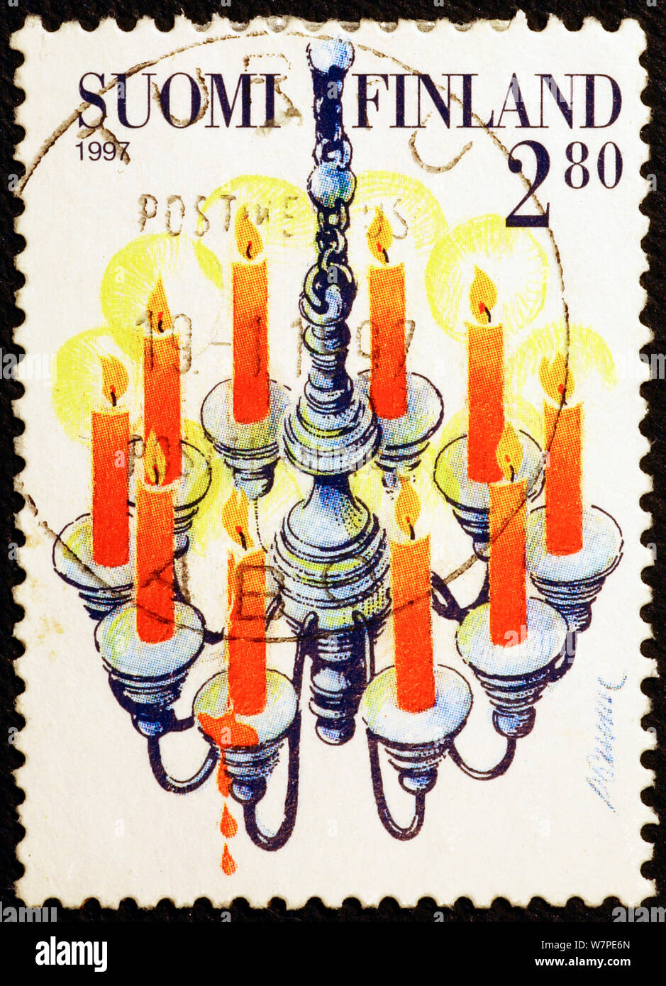 Christmas candles on finnish postage stamp Stock Photo
