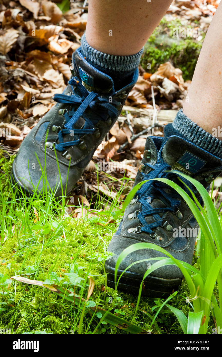 Hiking boots on the move. Scotland. Model released Stock Photo