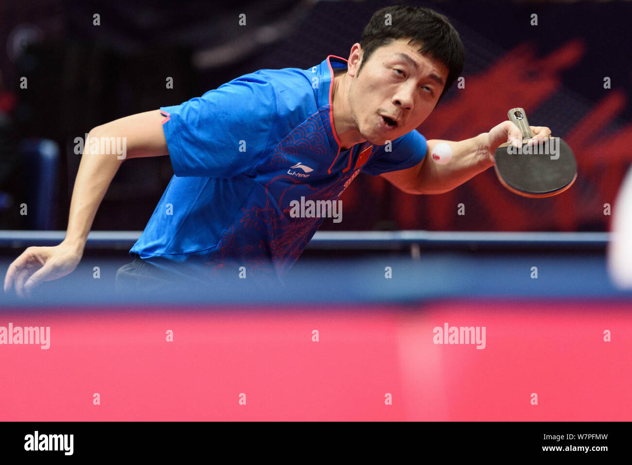 Xu Xin of China serves against Emmanuel Lebesson of France in the first round match of the Men's Singles during the Seamaster 2017 ITTF World Tour Pla Stock Photo