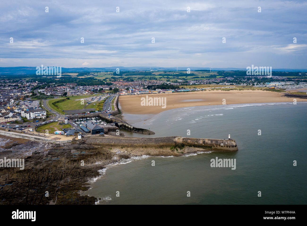 Aerial view of Porthcawl beach harbour and fun fair in South Wales UK
