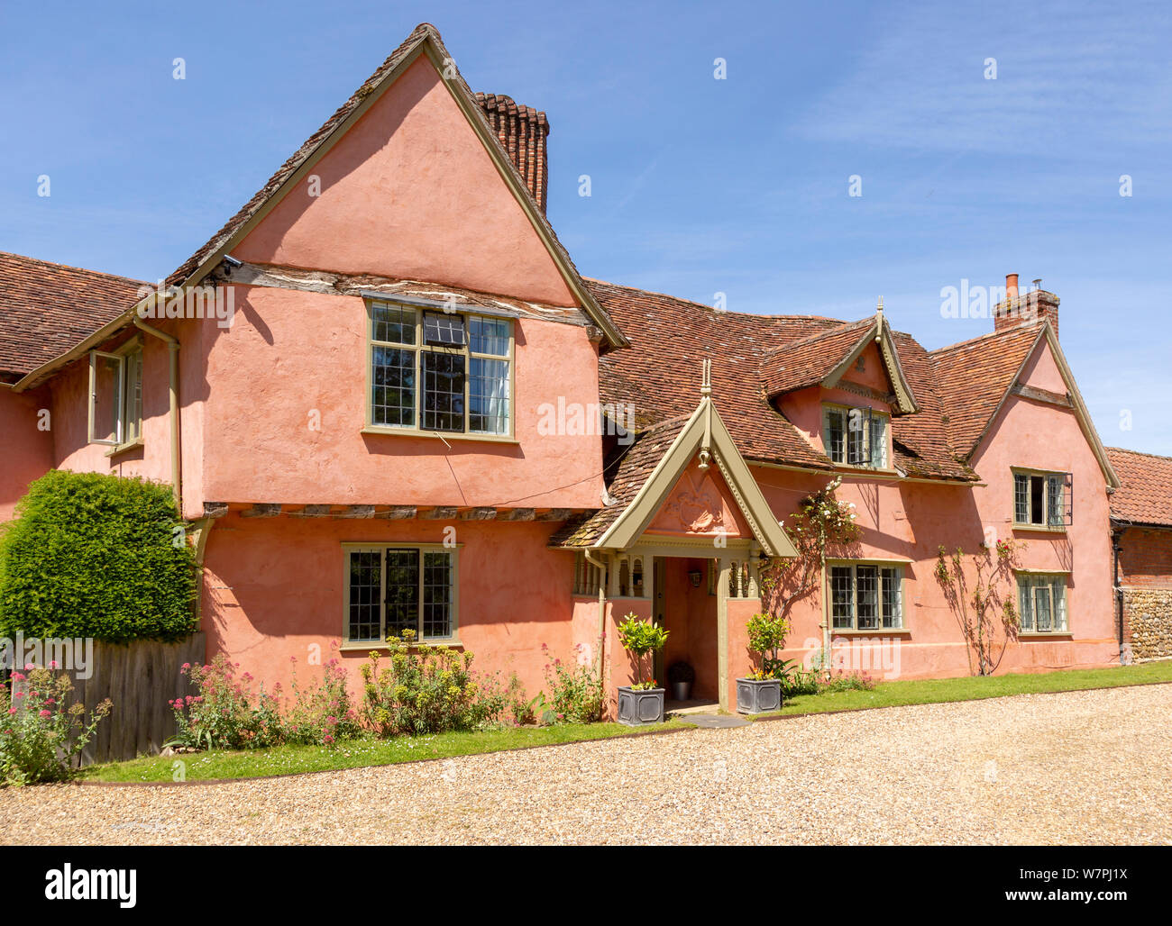 Historic traditional pink washed village house called The Grange