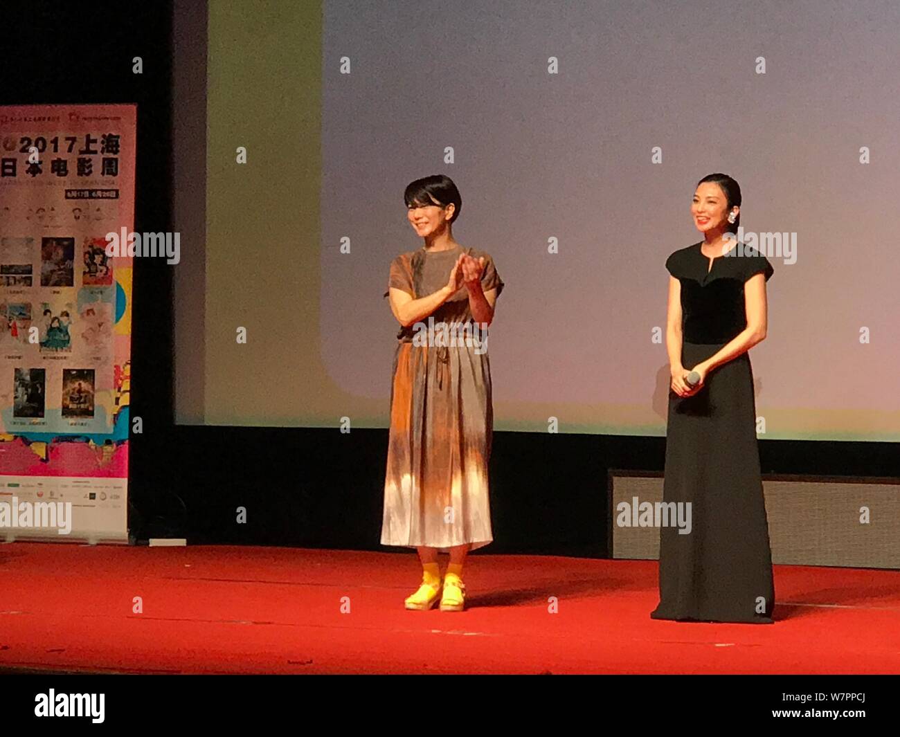 Japanese director Yukiko Mishima, left, and actress Rena Tanaka attend the opening ceremony of the Japan Film Week during the 20th Shanghai Internatio Stock Photo
