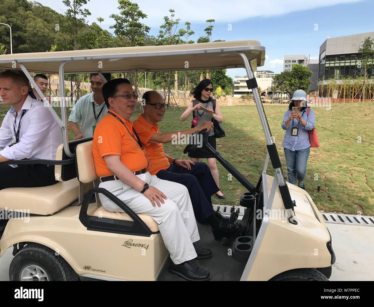 Li Ka-shing, Chairman of CK Hutchison Holdings, drives an electric car as he visits the Guangdong Technion-Israel Institute of Technology, commonly sh Stock Photo