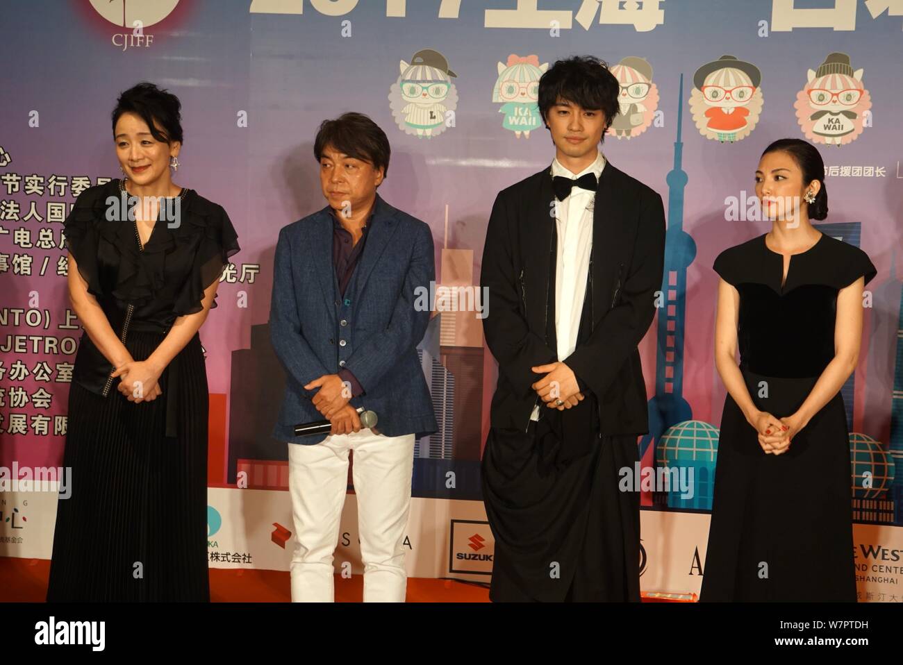 (From second left) Japanese director Hiroshi Nishitani, actor Takumi Saito and actress Rena Tanaka attend the Welcome Dinner of the Japan Film Week du Stock Photo