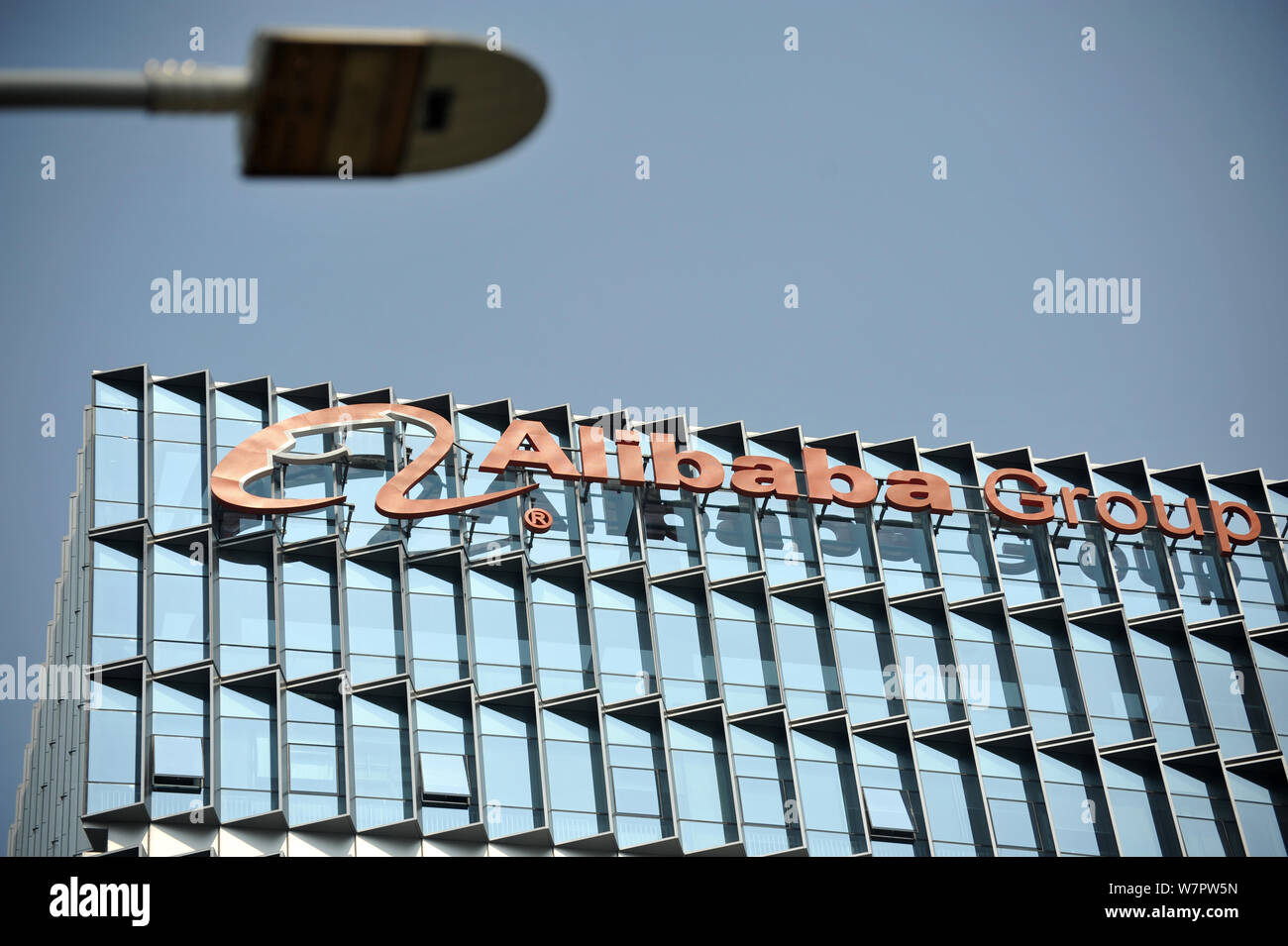 --FILE--A logo of Alibaba Group is pictured on the rooftop of an office ...