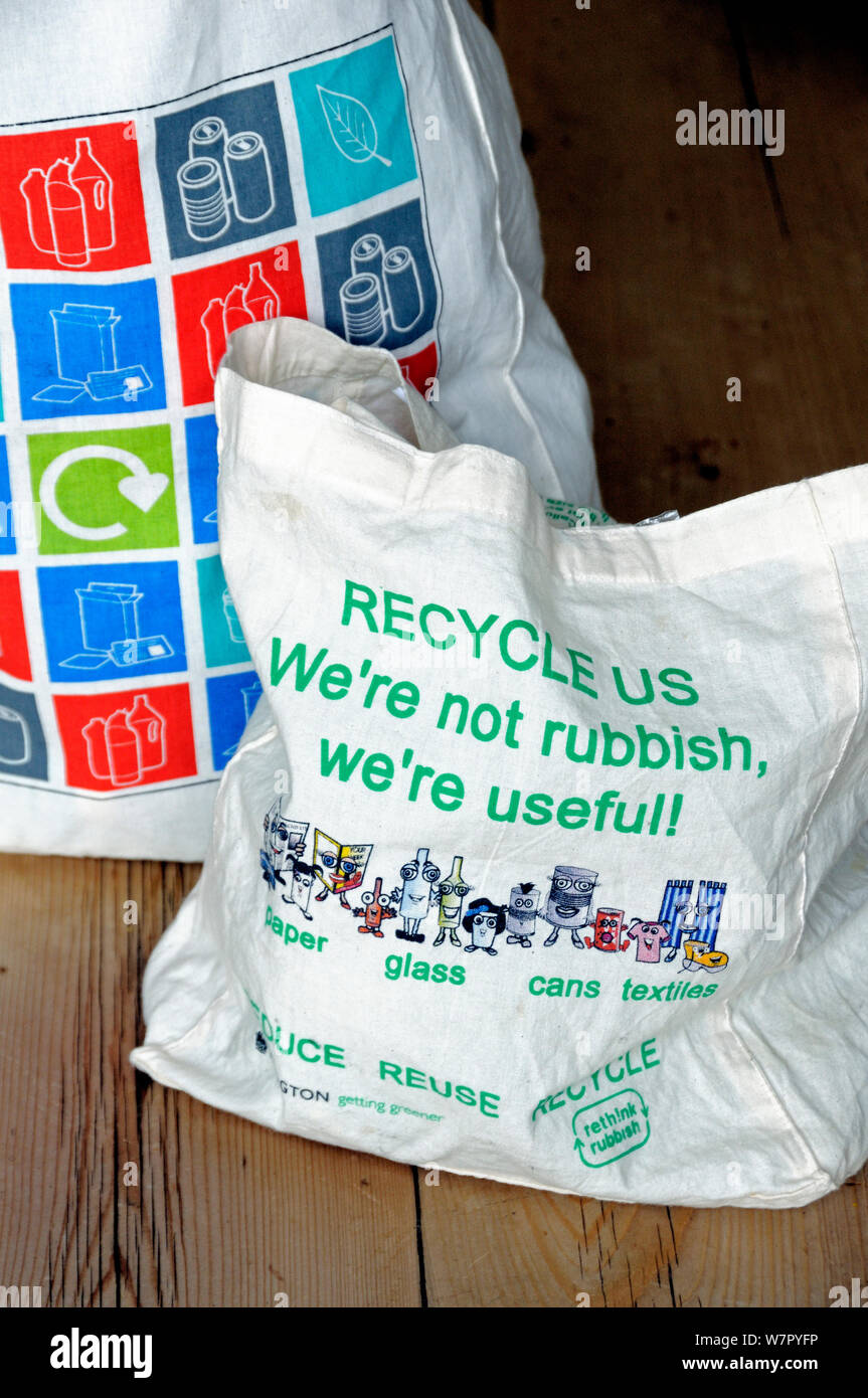 Reusable cotton bags on kitchen table, with images and text promoting ...