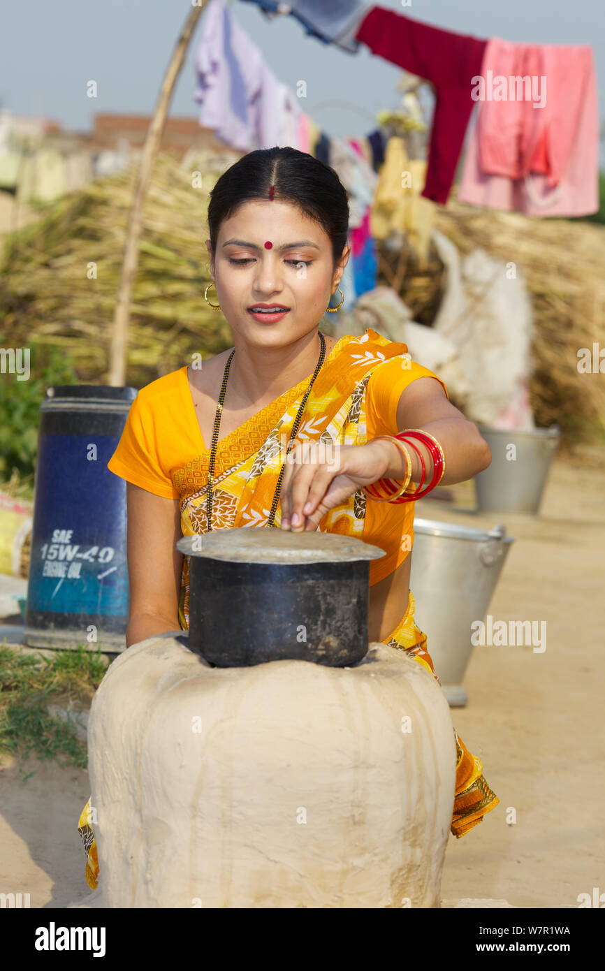 Rural woman preparing food Stock Photo