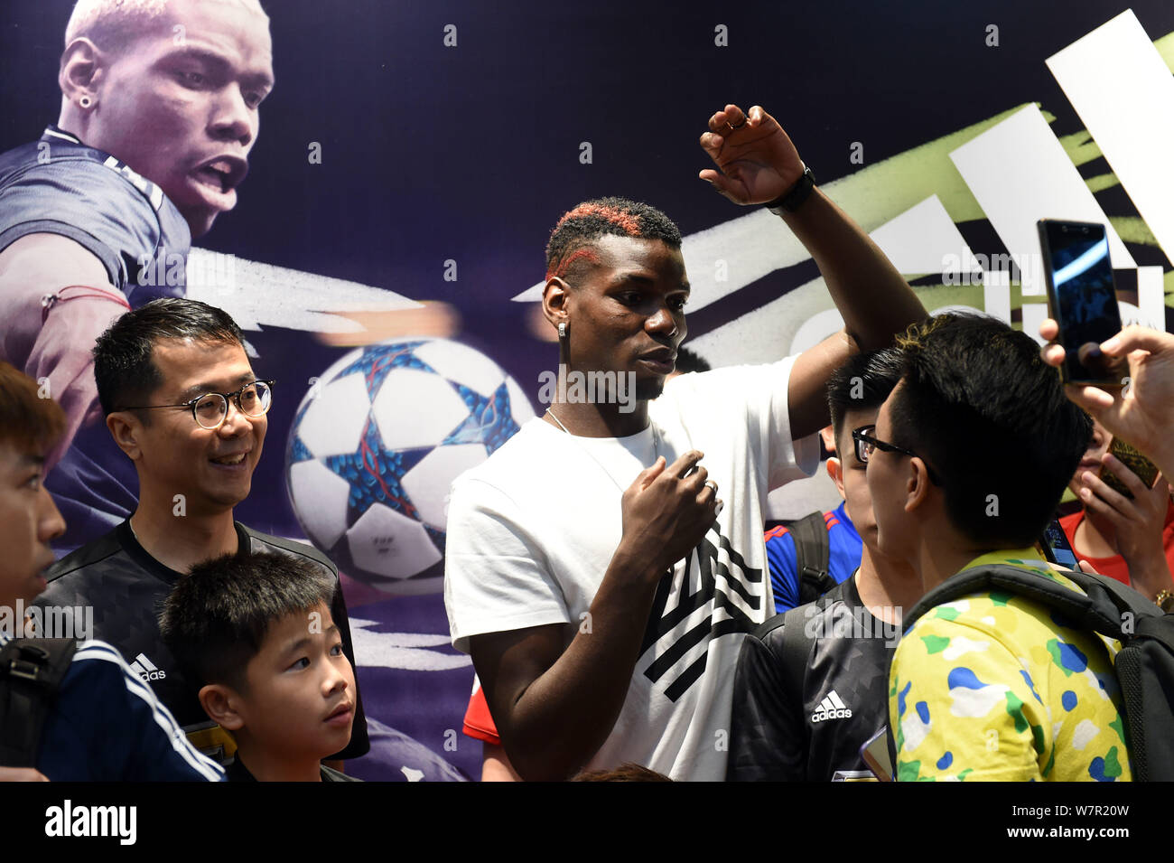 French football player Paul Pogba of English Premier League soccer club  Manchester United, center, attends a promotional event for Adidas Tango  League Stock Photo - Alamy