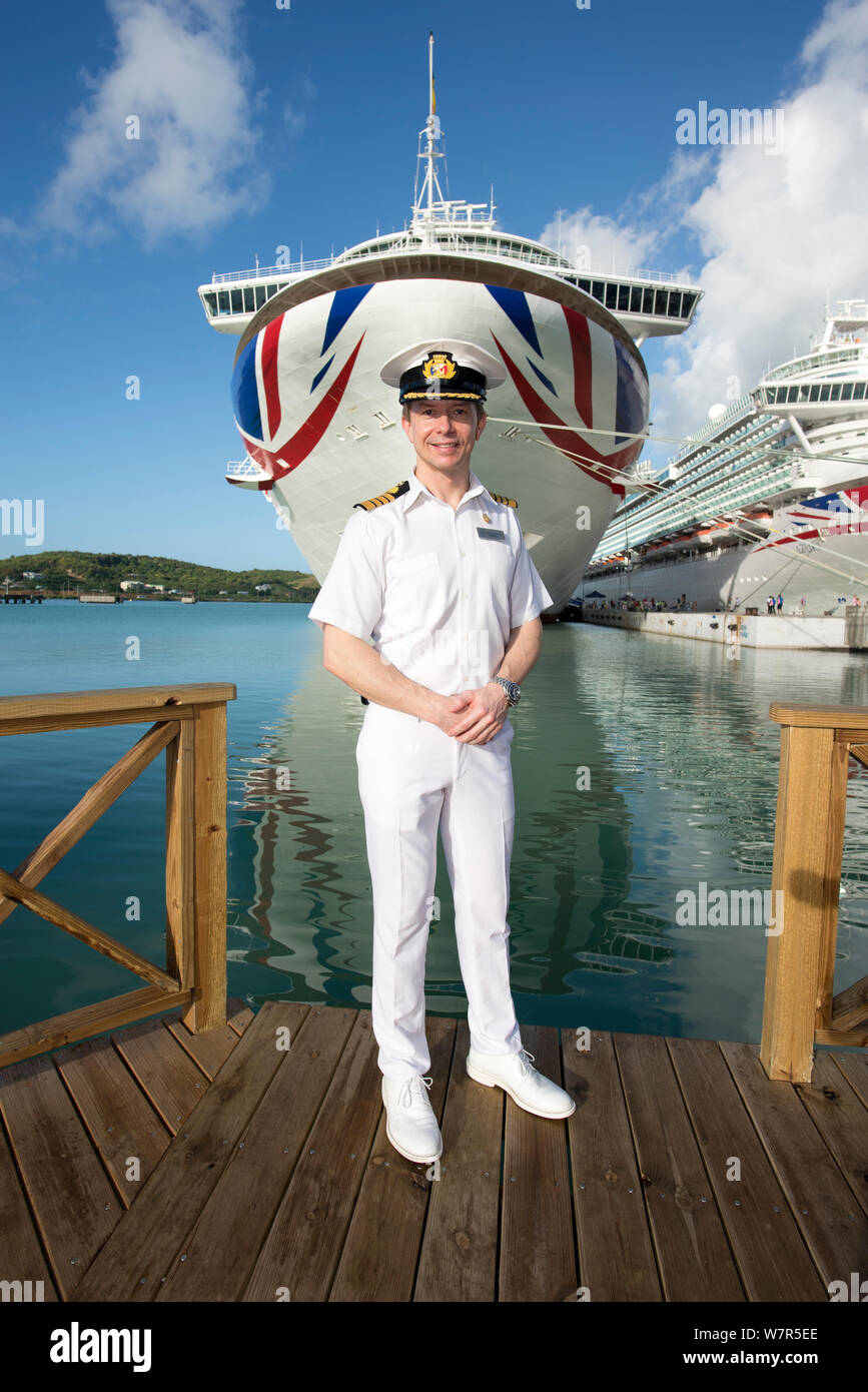 Captain Marcin Banach photo shoot with P&O cruises ships Ventura and Azura in Antigua Stock Photo
