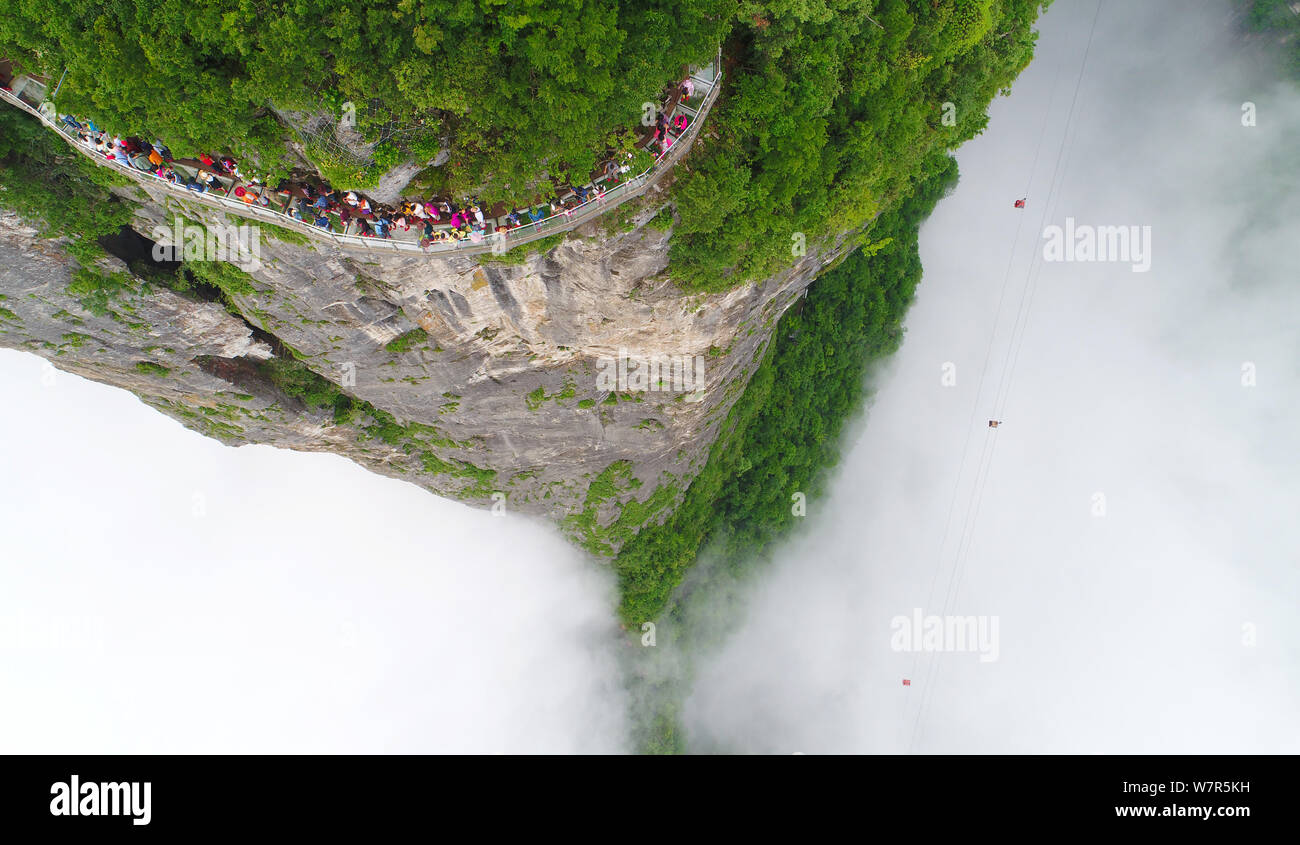 Aerial View Of The Tianmen Mountain Or Tianmenshan Mountain Surrounded By Clouds In Zhangjiajie National Forest Park In Zhangjiajie City Central Ch Stock Photo Alamy