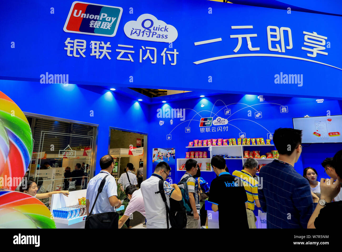 Visitors crowd the stand of China UnionPay during the 2017 Mobile World Congress (MWC) in Shanghai, China, 28 June 2017.   The Mobile World Congress 2 Stock Photo