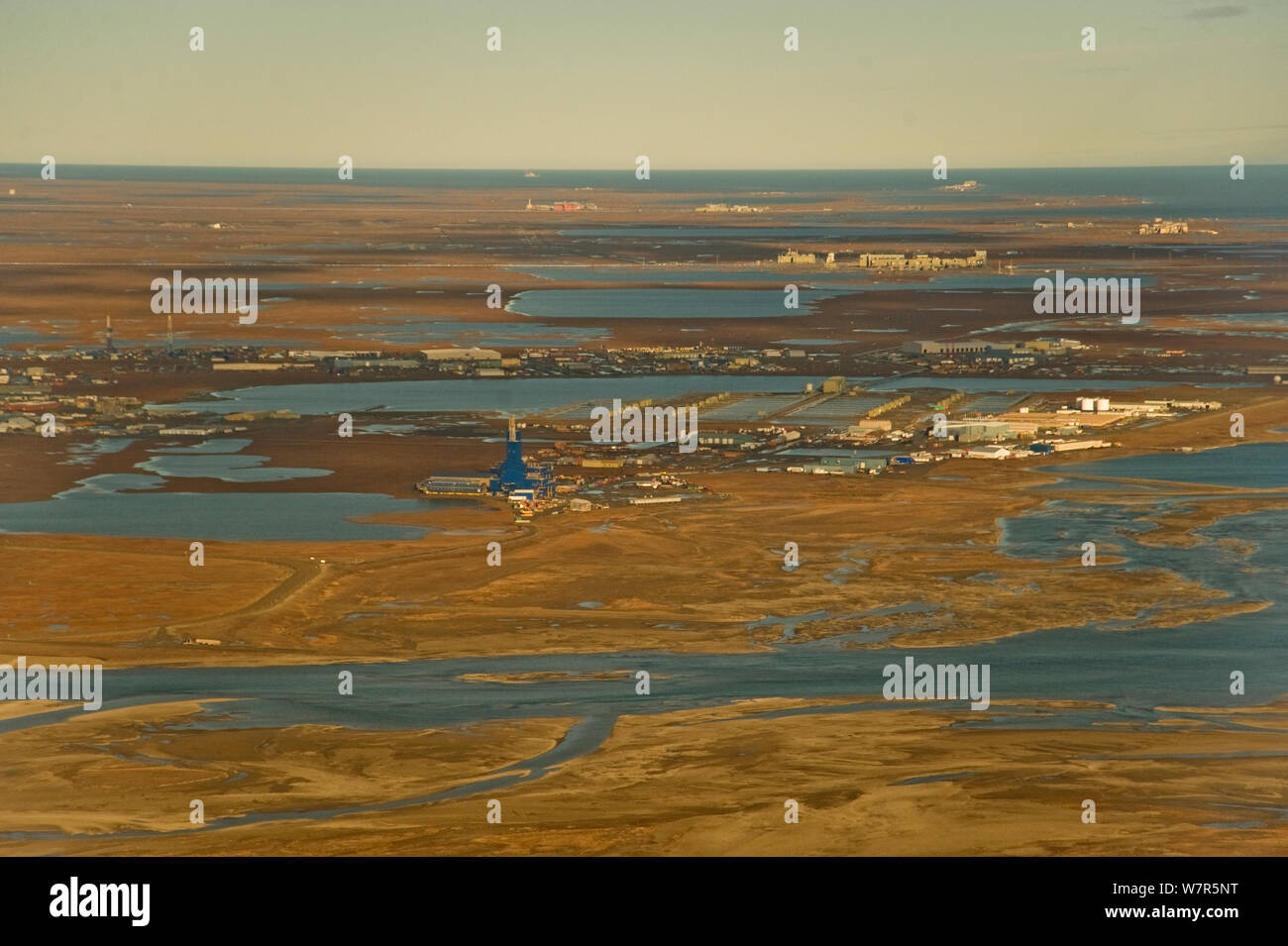 Aerial landscape view of Prudhoe Bay oil fields, central arctic coast, North Slope, Alaska. Stock Photo
