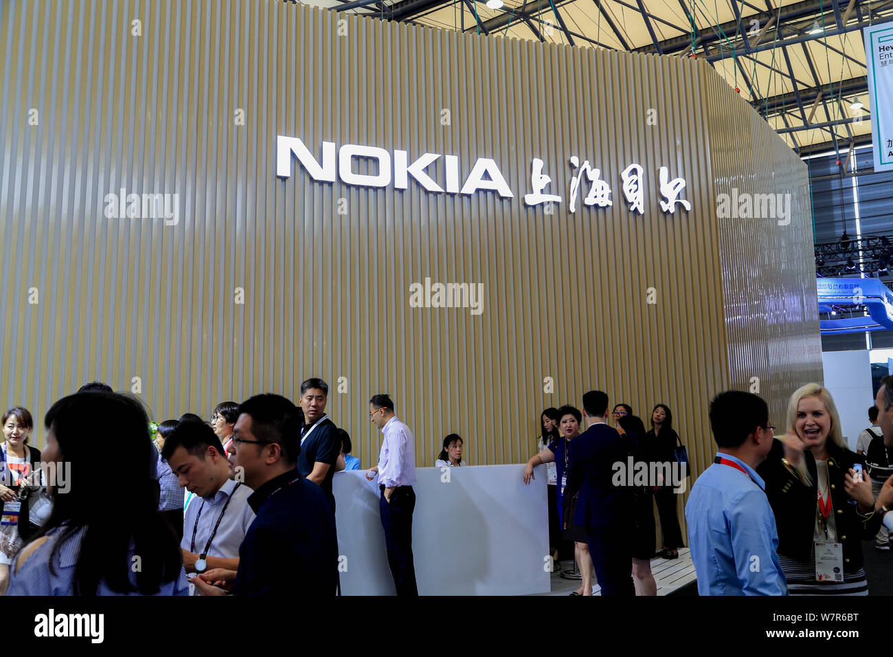 People visit the stand of NOKIA during the 2017 Mobile World Congress (MWC) in Shanghai, China, 28 June 2017.   The Mobile World Congress 2017 opened Stock Photo