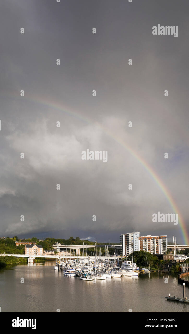 Boats moored in Penarth marina, with rainbow, Cardiff, Wales, UK, September 2012. Stock Photo
