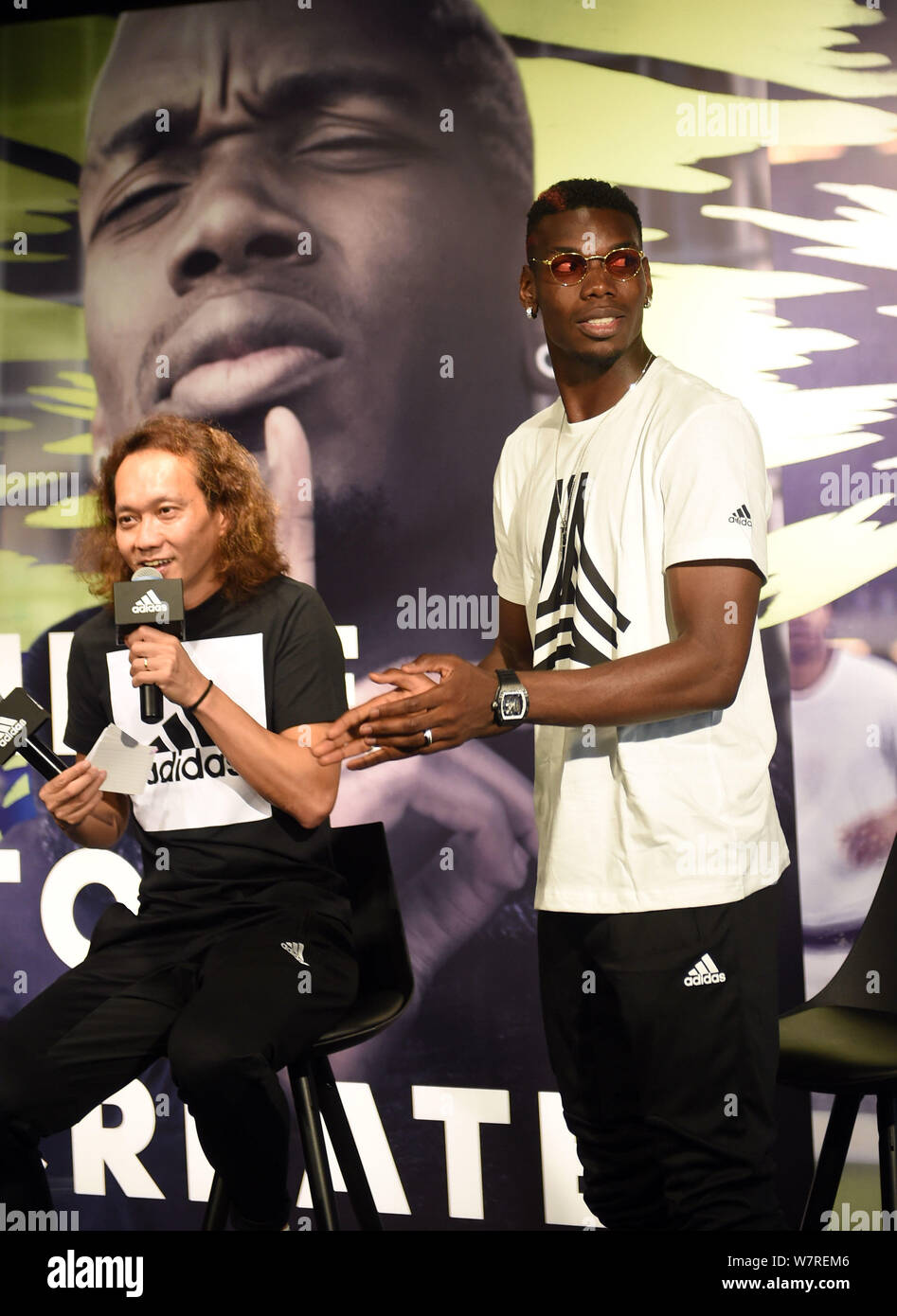 French football player Paul Pogba of English Premier League soccer club  Manchester United, right, attends a promotional event for Adidas Tango  League Stock Photo - Alamy