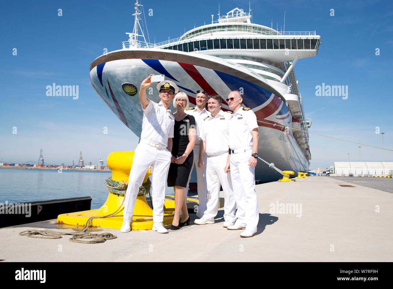 Photoshoot with senior management team of P&O Cruises ship mv Ventura showing officers and exterior view of cruise ship Stock Photo