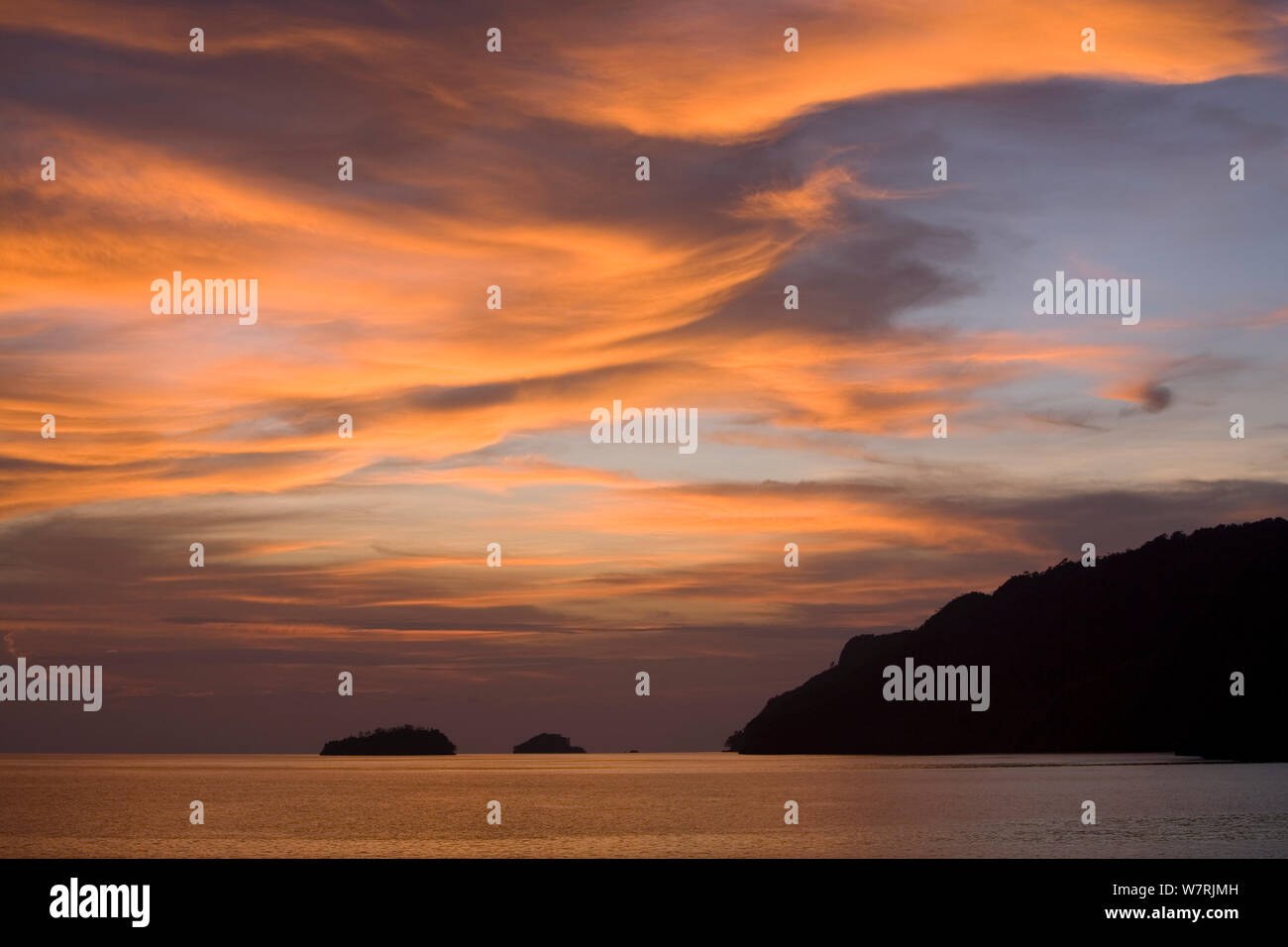 Sunset in Raja Ampat, Irian Jaya, West Papua, Indonesia, Pacific Ocean Stock Photo