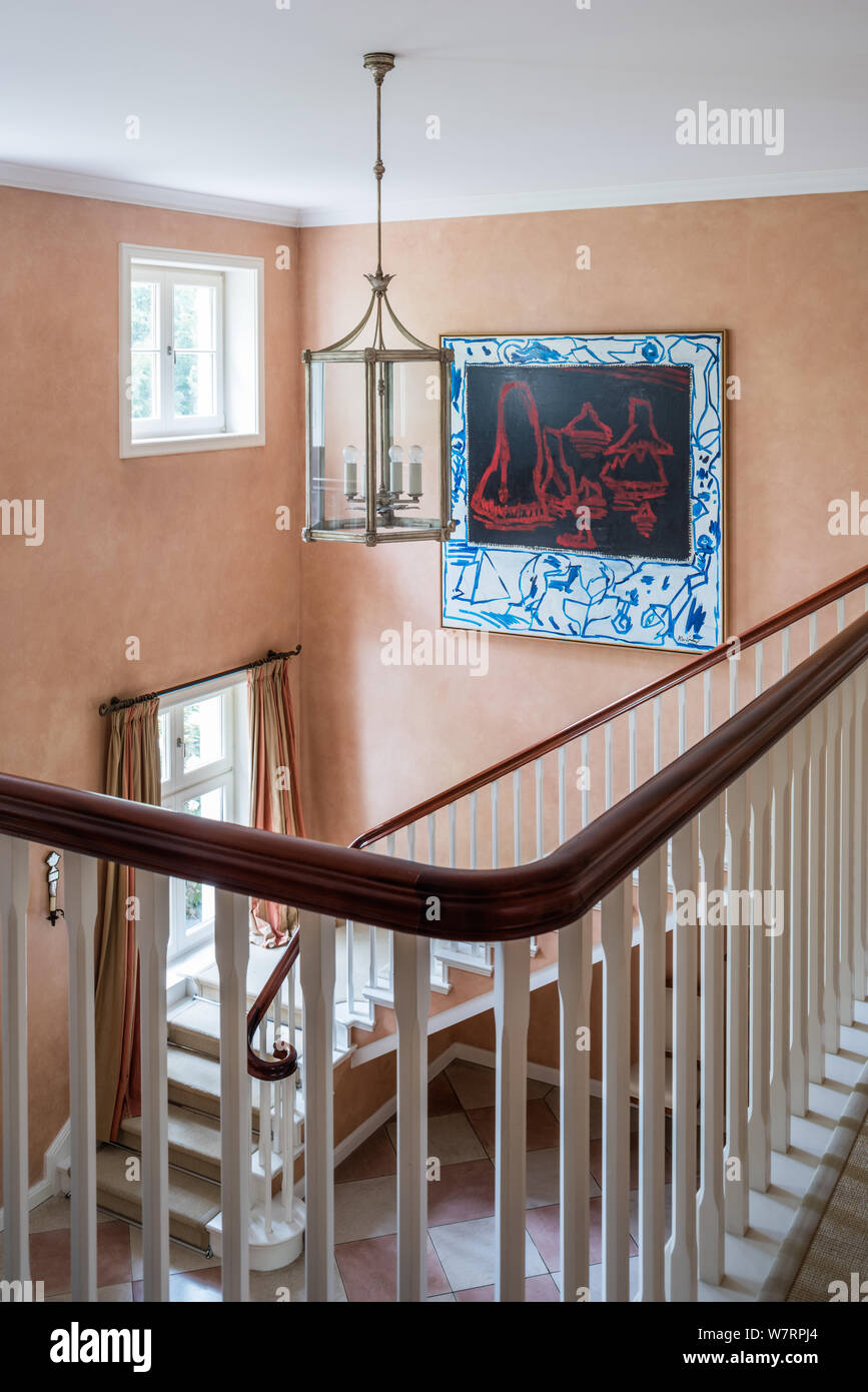 Modern painting over staircase Stock Photo