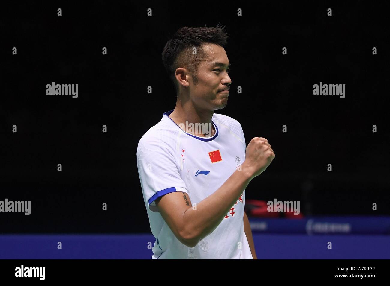 Lin Dan of China reacts after defeating Lee Chong Wei of Malaysia in their semifinal match of the men's singles during the 2017 Badminton Asia Champio Stock Photo