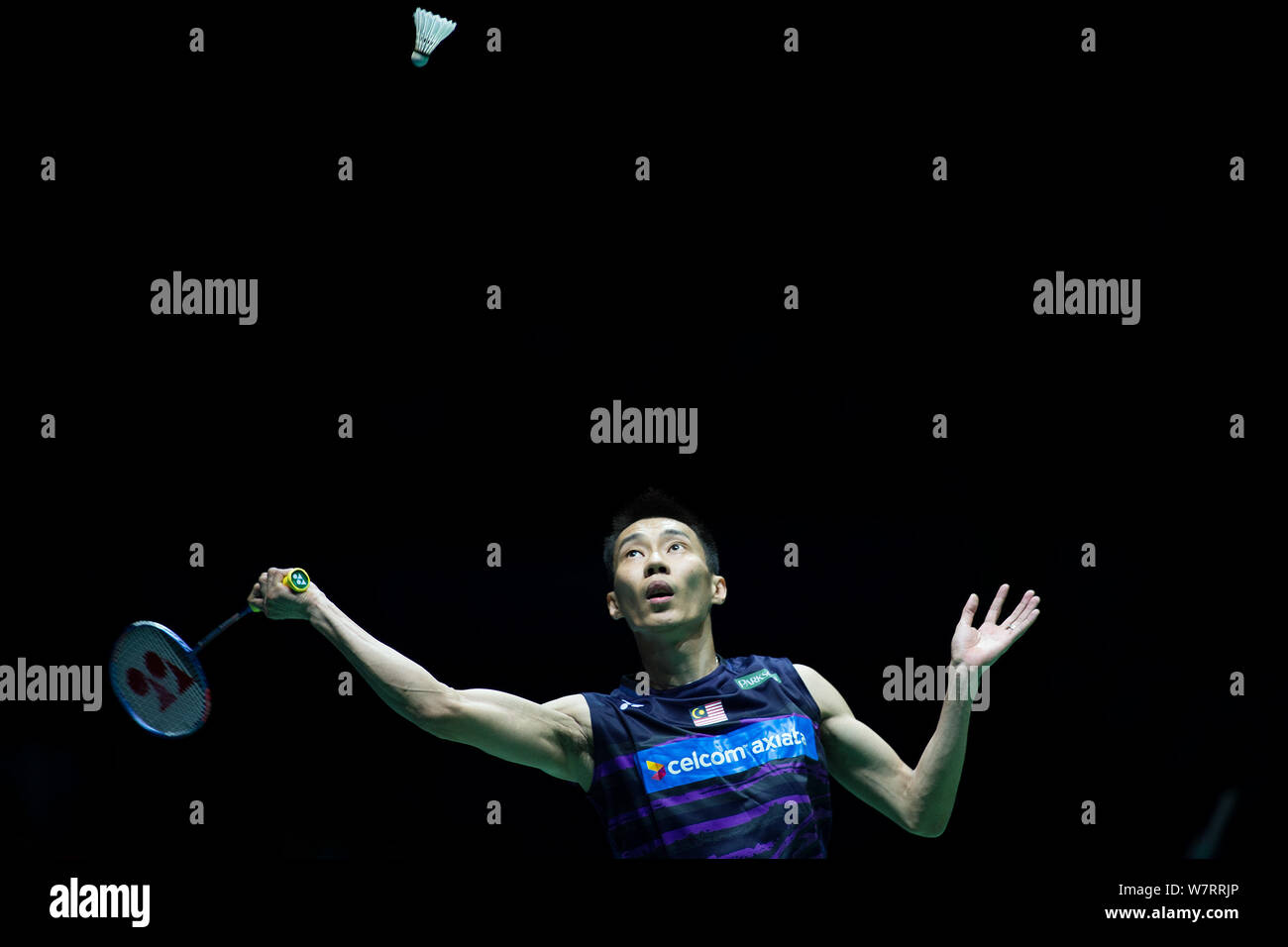 Lee Chong Wei of Malaysia returns a shot to Lin Dan of China in their semifinal match of the men's singles during the 2017 Badminton Asia Championship Stock Photo