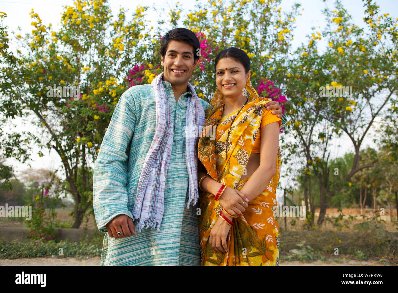 Rural couple standing together Stock Photo - Alamy