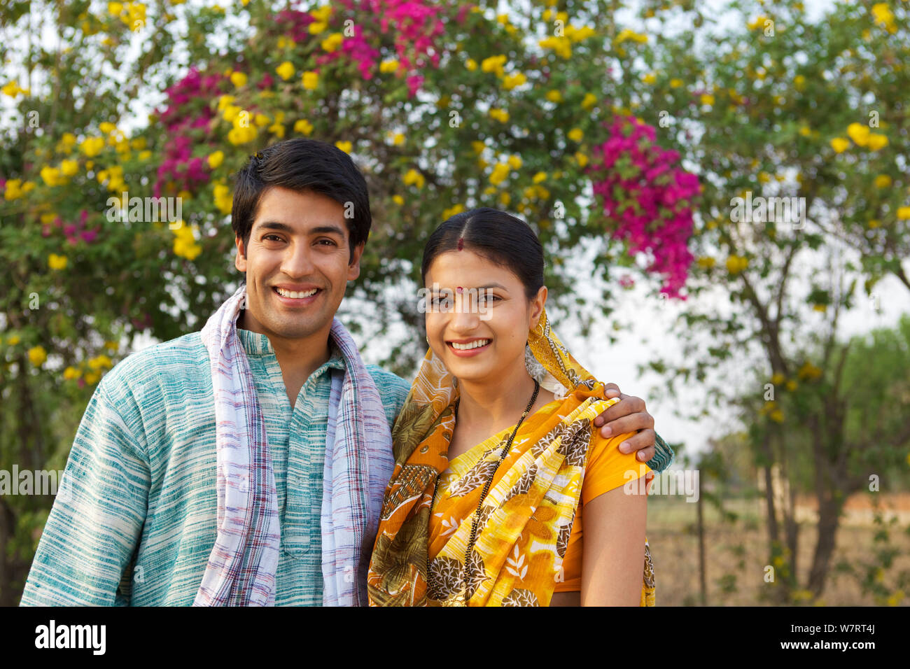 Rural couple smiling together Stock Photo - Alamy