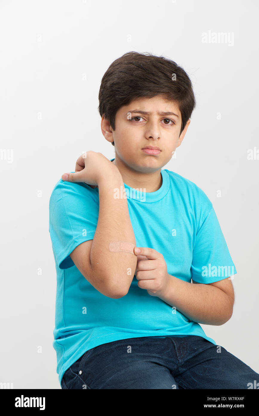 Boy with bandage on his hand Stock Photo Alamy