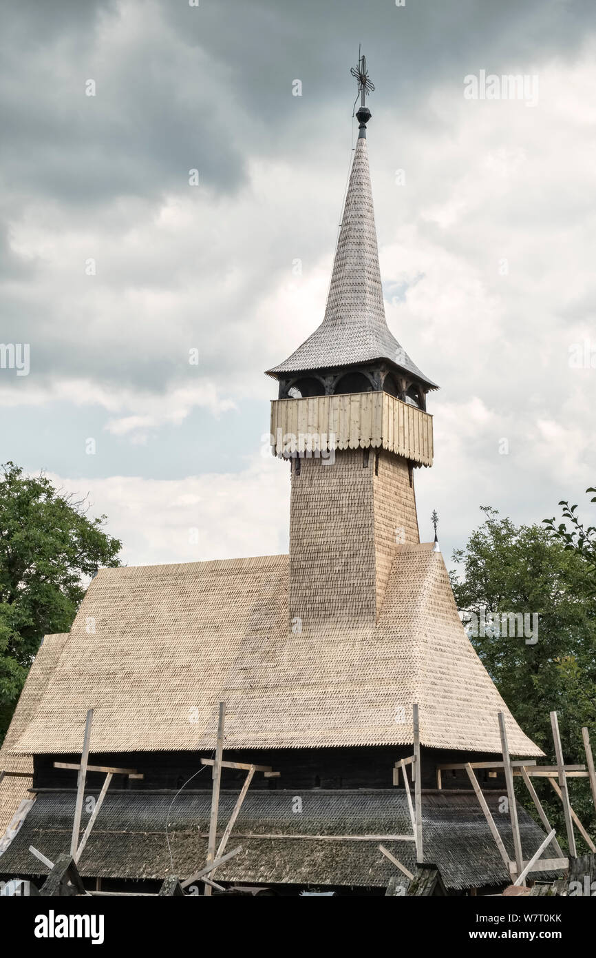 Ieud Hill Church, Maramureș, Romania (c1620) undergoing repairs. The wooden roof shingles have to be replaced every 25 years Stock Photo