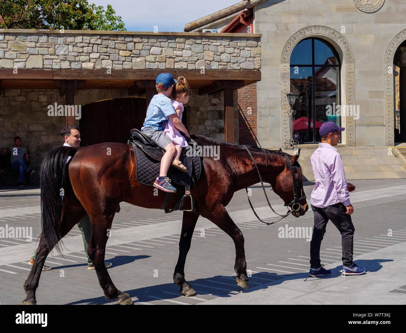 Horseriding for photography at cathedral Sweti Zschoweli-Sveti Tskhoveli in Mzcheta,  Georgia, Europe Stock Photo